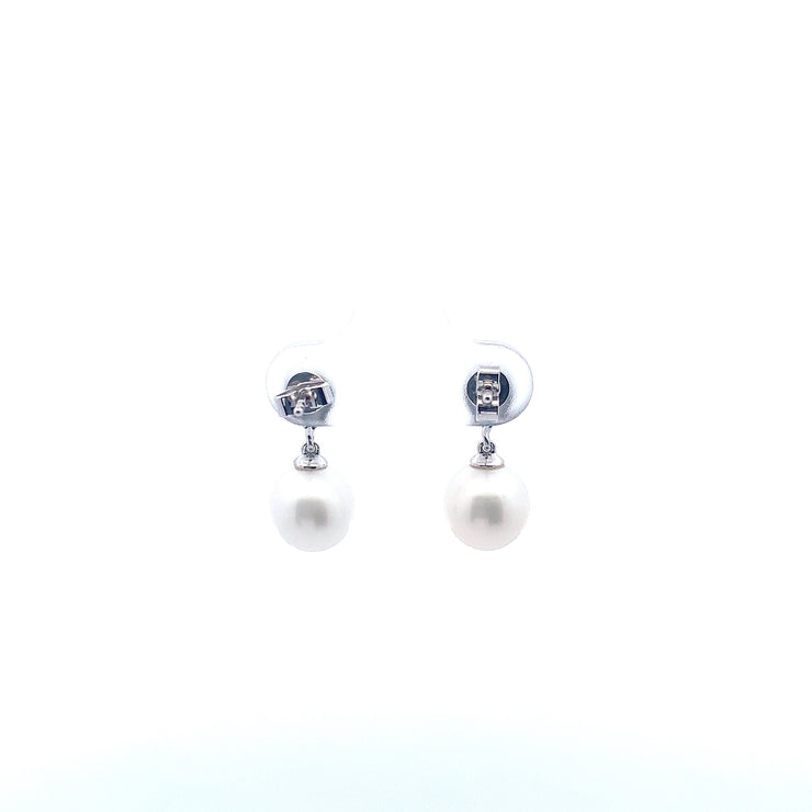 Ladies 14K White Gold Pearl (7.48) Sahpphire (.43) and Natural Diamond (.07) Earrings.